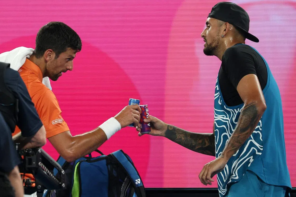 FILE PHOTO: Tennis - Australian Open - Exhibition Match - Melbourne Park, Melbourne, Australia - January 13, 2023 Serbia's Novak Djokovic and Australia's Nick Kyrgios during the exhibition match REUTERS/Loren Elliott/File Photo
