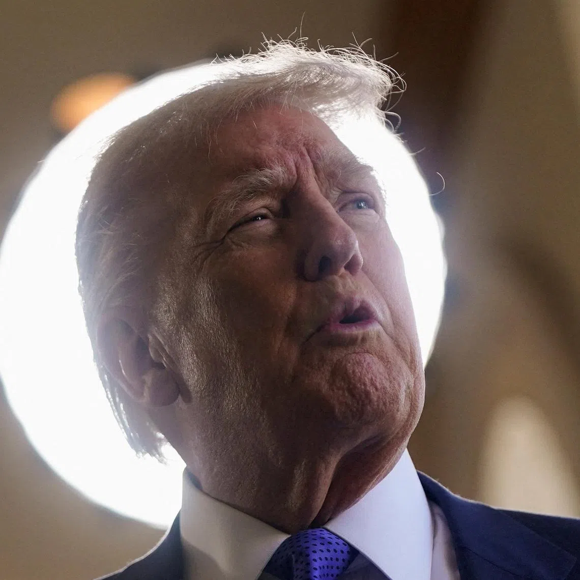FILE PHOTO: U.S. President Donald Trump arrives ahead of the wedding of Dan Scavino, White House deputy chief of staff, and Erin Elmore, the director of Art in Embassies at the U.S. Department of State, at Mar-a-Lago in Palm Beach, Florida, U.S. February 1, 2026. REUTERS/Nathan Howard/File Photo