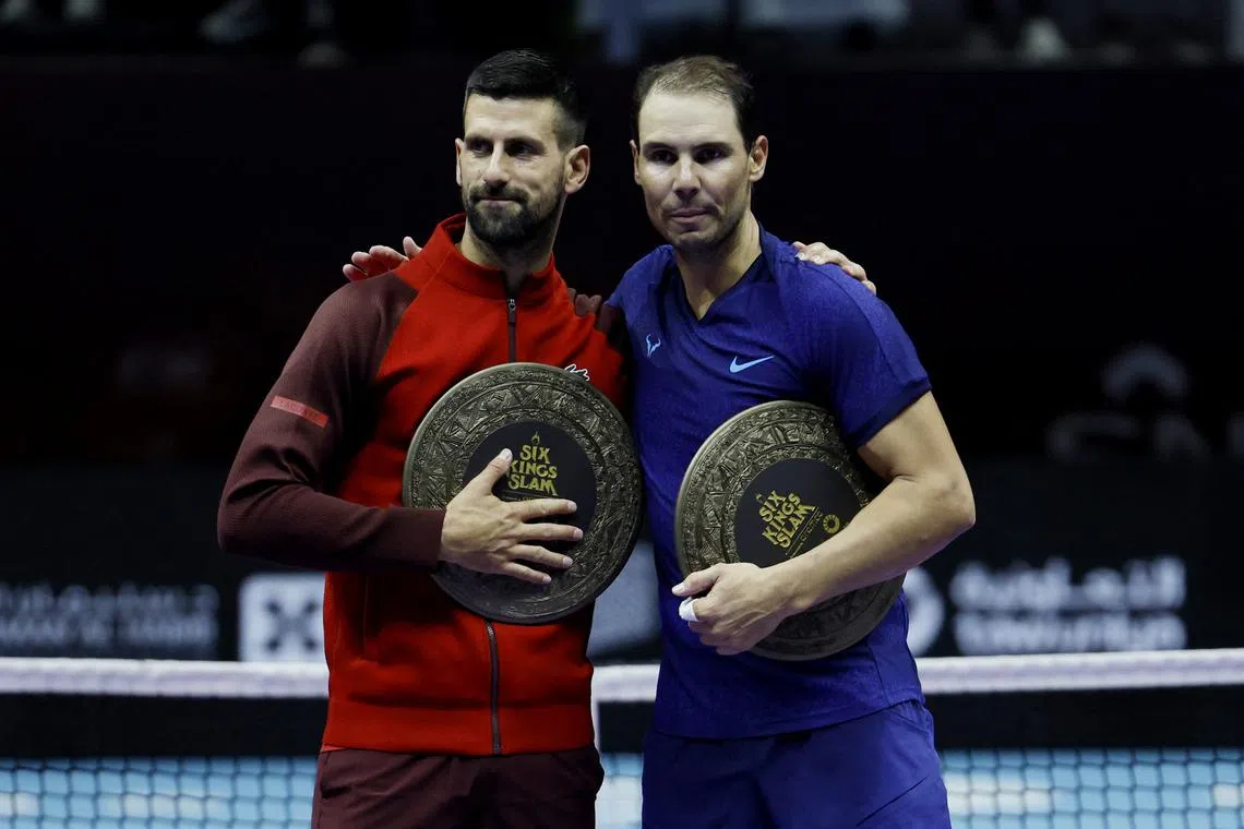 Serbia's Novak Djokovic and Spain's Rafael Nadal pose after their third place match.