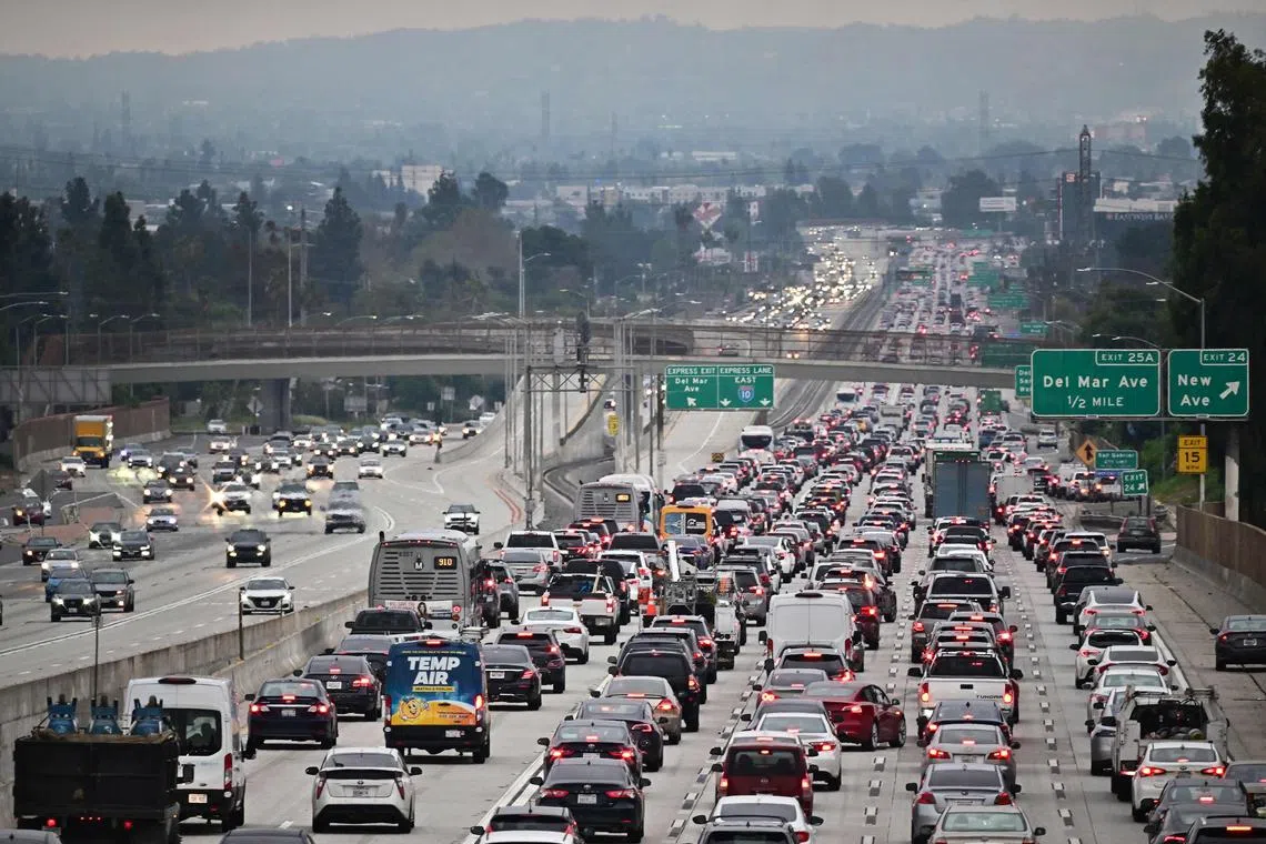 (FILES) Traffic on a Los Angeles freeway during the evening rush hour commute on April 12, 2023 in Alhambra, California. The US transition to electric cars has hit a speed bump, with concerns about vehicle range and limited charging capacity adding to core affordability issues.
Automakers in recent weeks have pushed back EV sales targets and delayed capital projects as they seek to reduce inventories of unsold EVs at dealerships. (Photo by Frederic J. BROWN / AFP)