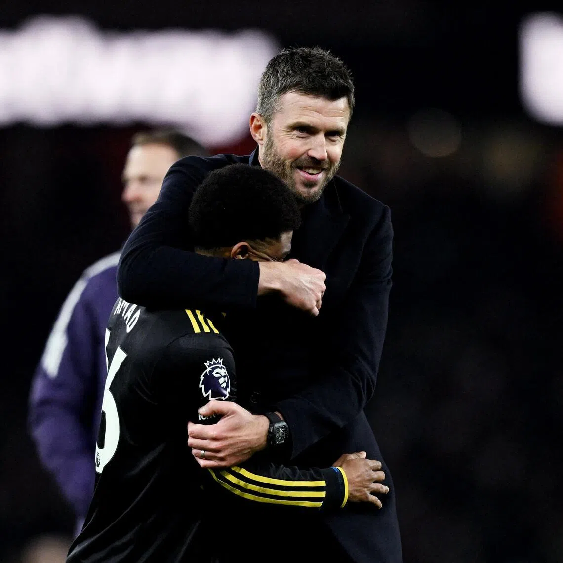 Manchester United interim manager Michael Carrick celebrating with forward Amad Diallo after their 3-2 win over Arsenal on Jan 25.