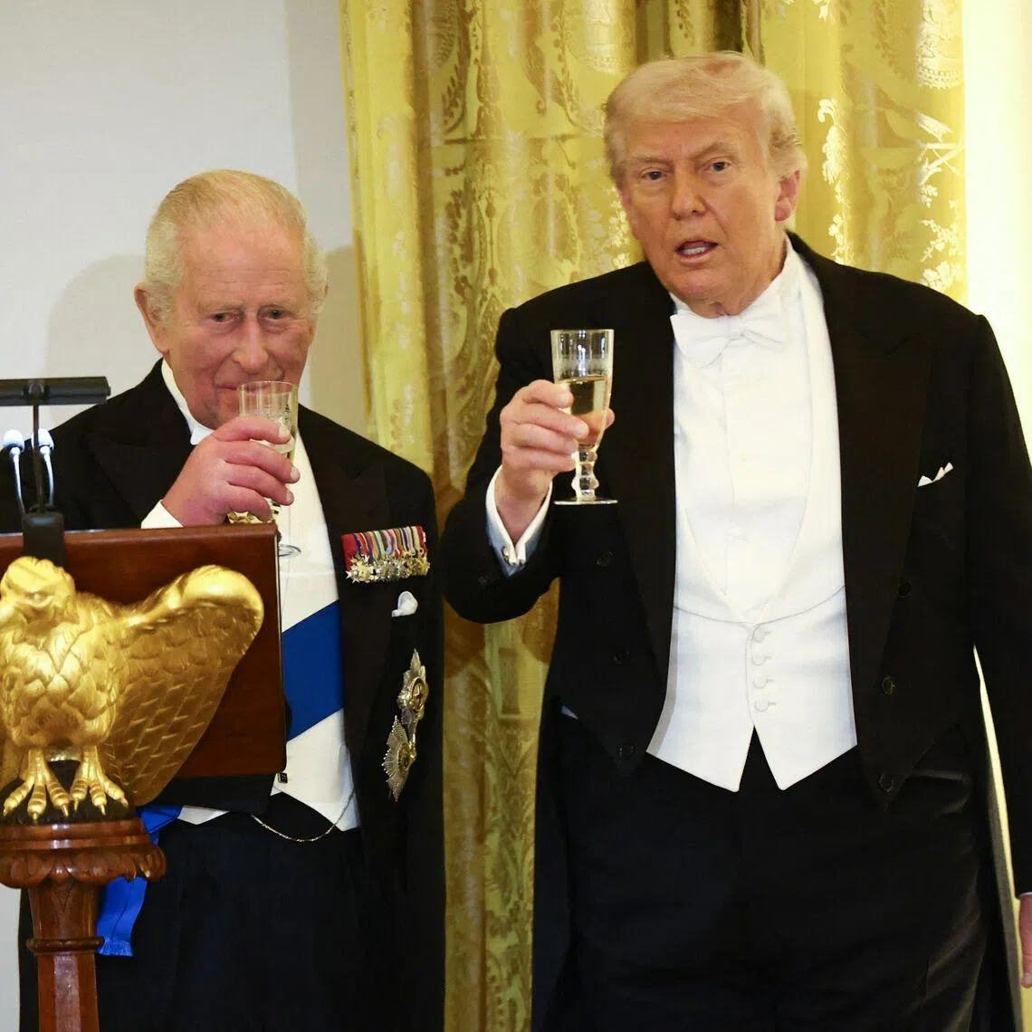 US President Donald Trump and Britain's King Charles III raise a toast during a State Dinner in the White House in Washington, DC, on April 28.