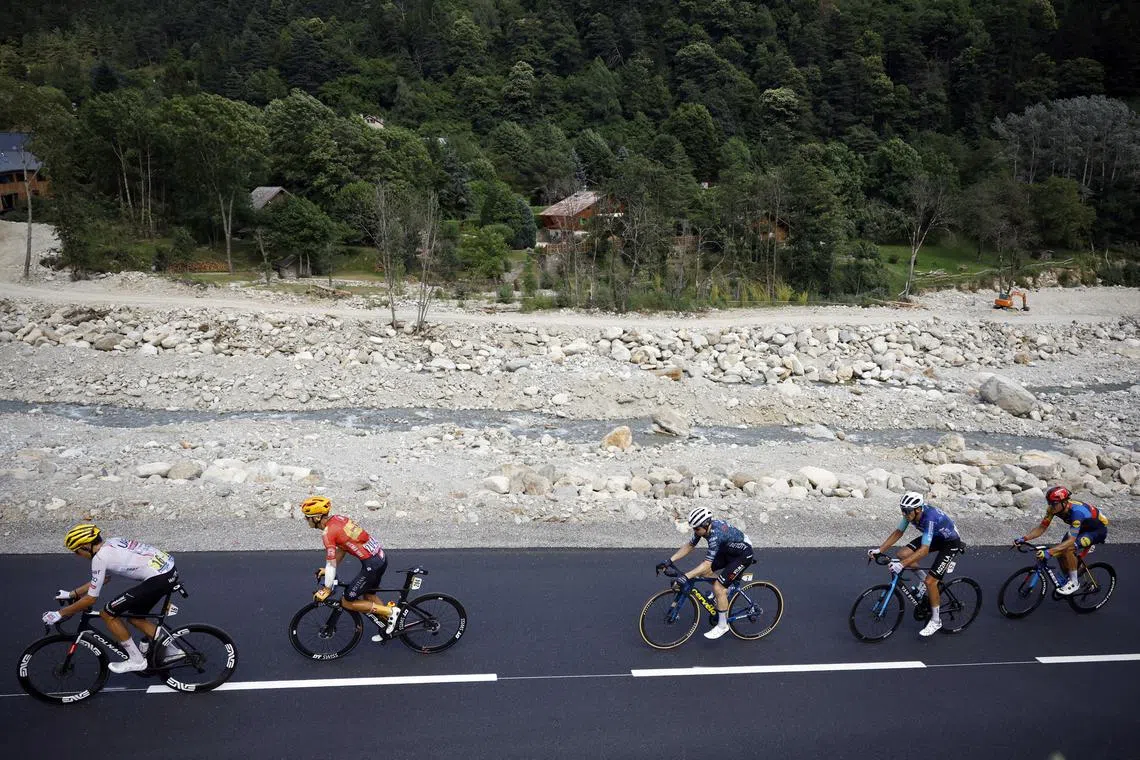 Cycling - Tour de France - Stage 20 - Nice to Col de la Couillole - Nice, France - July 20, 2024 General view of riders in Saint-Martin-Vesubie during stage 20 REUTERS/Stephane Mahe/File Photo
