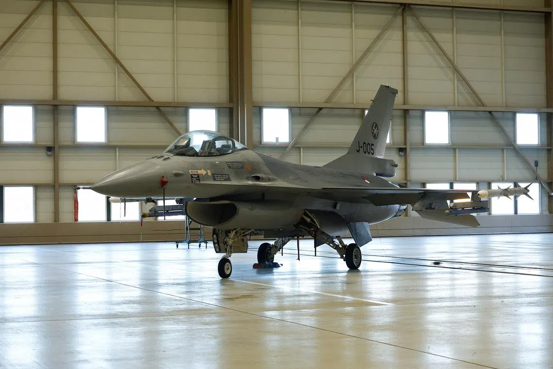 A general view of an F-16, on the day of a visit from Ukrainian President Volodymyr Zelenskiy, in Eindhoven, Netherlands, August 20, 2023. REUTERS/Piroschka van de Wouw/ File Photo