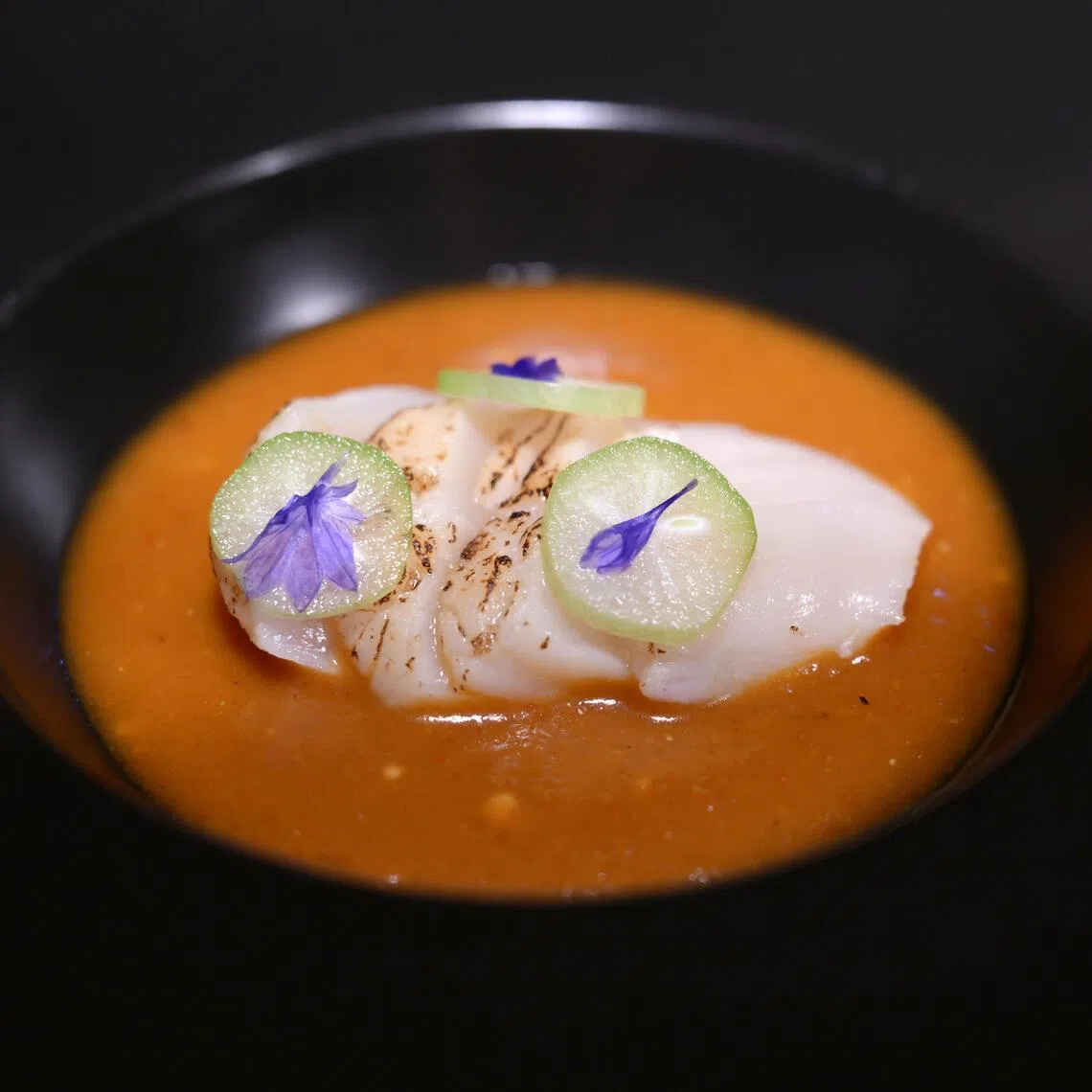 Private chef Ilya Nur Fadhly puts a modern spin on paceri but serves it saucy, cold, and with torched scallop.