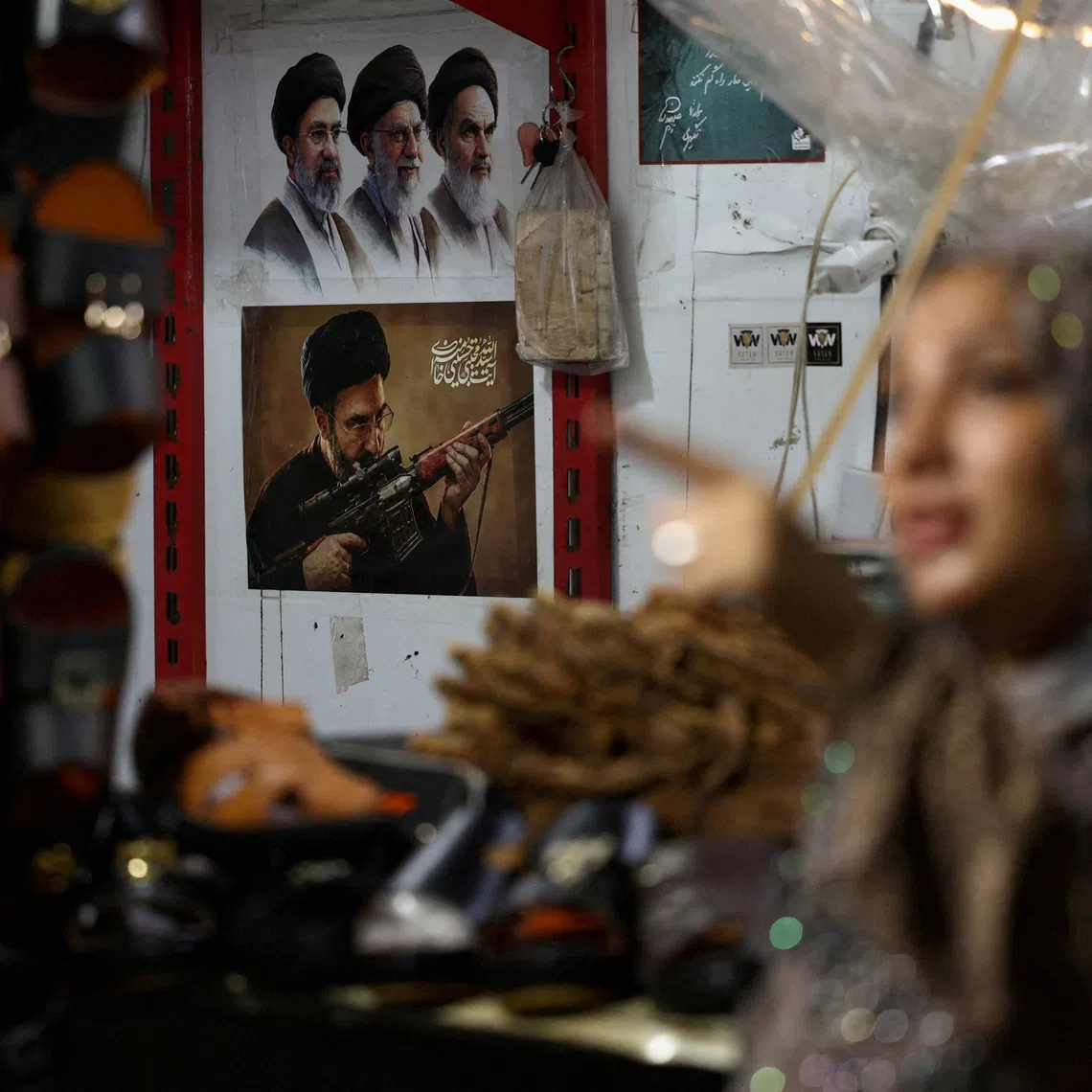 A picture of Iran’s Supreme Leader, Mojtaba Khamenei, is displayed at a store in a local market in Bandar Abbas, Iran.
