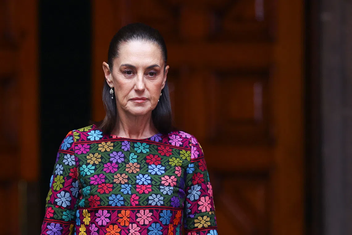 FILE PHOTO: Mexican President Claudia Sheinbaum walks to receive Swiss Federal President Guy Parmelin at the National Palace in Mexico City, Mexico, July 8, 2026. REUTERS/Daniel Becerril/ File Photo