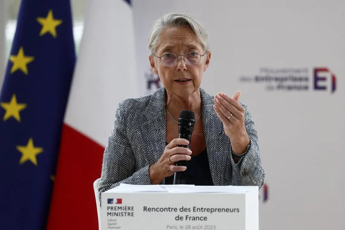 FILE PHOTO: French Prime Minister Elisabeth Borne speaks during the MEDEF union summer forum \"La Rencontre des Entrepreneurs de France, LaREF\" at the Paris Longchamp Racecourse in Paris, France, August 28, 2023. REUTERS/Benoit Tessier/File Photo