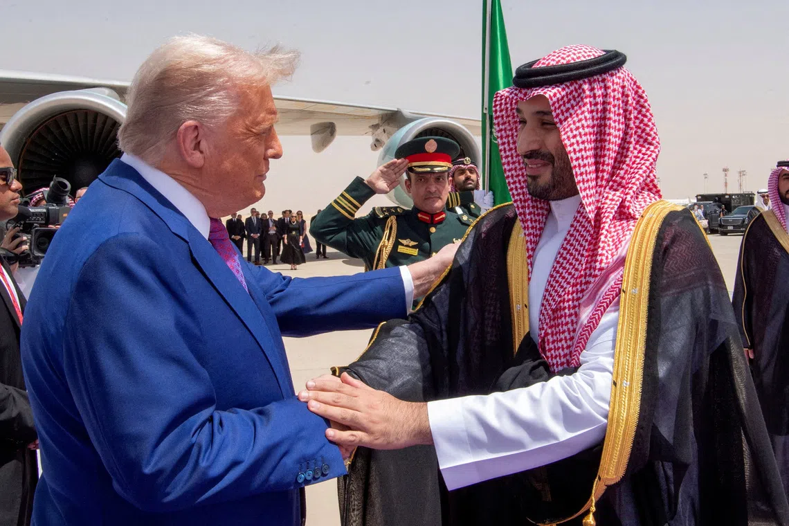 FILE PHOTO: U.S. President Donald Trump shakes hands with Saudi Crown Prince Mohammed Bin Salman during a welcoming ceremony in Riyadh, Saudi Arabia, May 13, 2025. Bandar Algaloud/Courtesy of Saudi Royal Court/Handout via REUTERS/File Photo