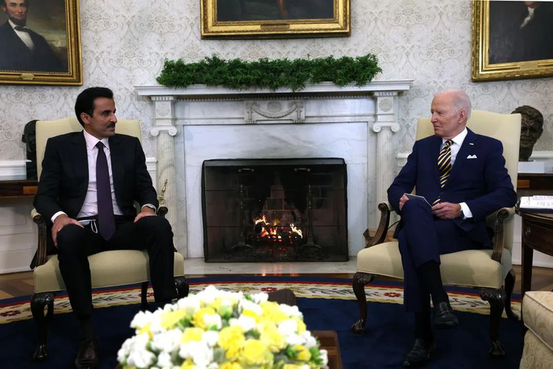 U.S. President Joe Biden holds a bilateral meeting with Qatar's Emir Sheikh Tamim bin Hamad al-Thani in the Oval Office at the White House in Washington, U.S., January 31, 2022. REUTERS/Leah Millis/File Photo