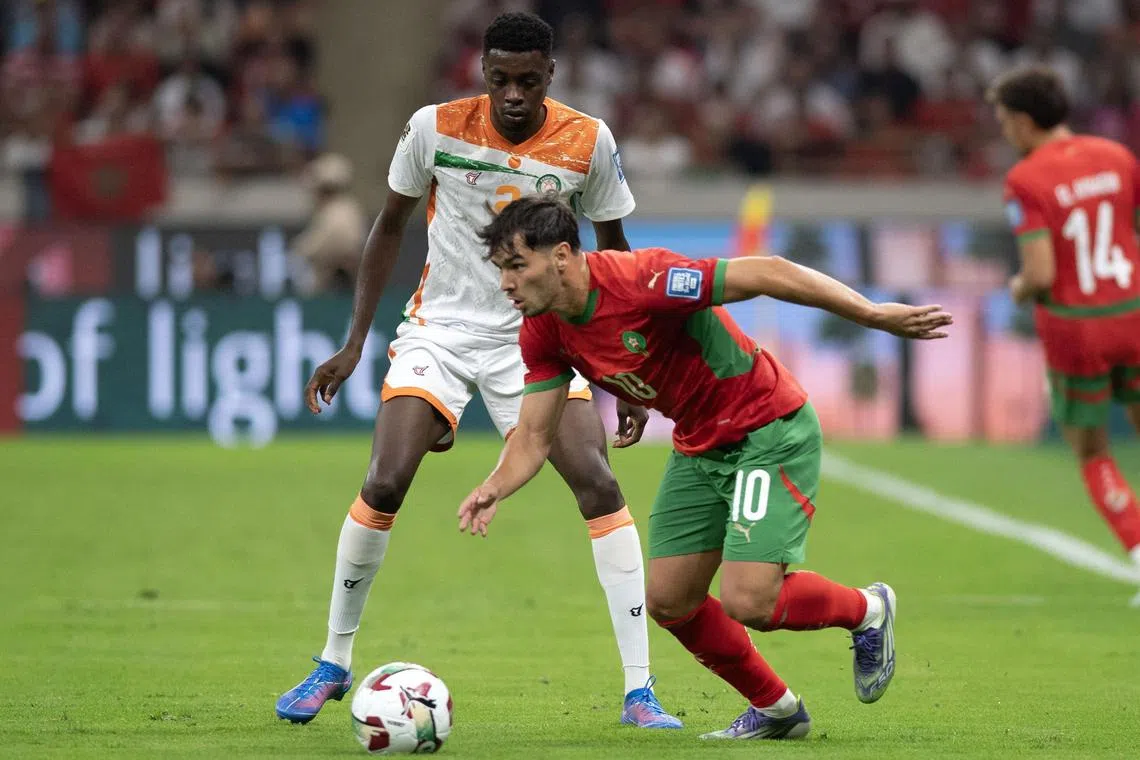 Morocco’s Brahim Diaz is marked by Niger's Rahim Alhassane in their World Cup qualifier in Rabat on Sept 5, 2025.