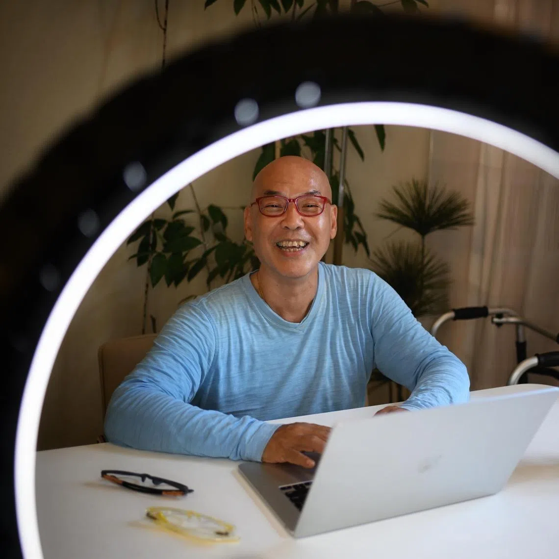 Mr Ricky Law, 69, lives alone and likes it. The lecturer in digital marketing does livestreams on ageing, plays sports and makes a point to dress up including changing his spectacle frames.