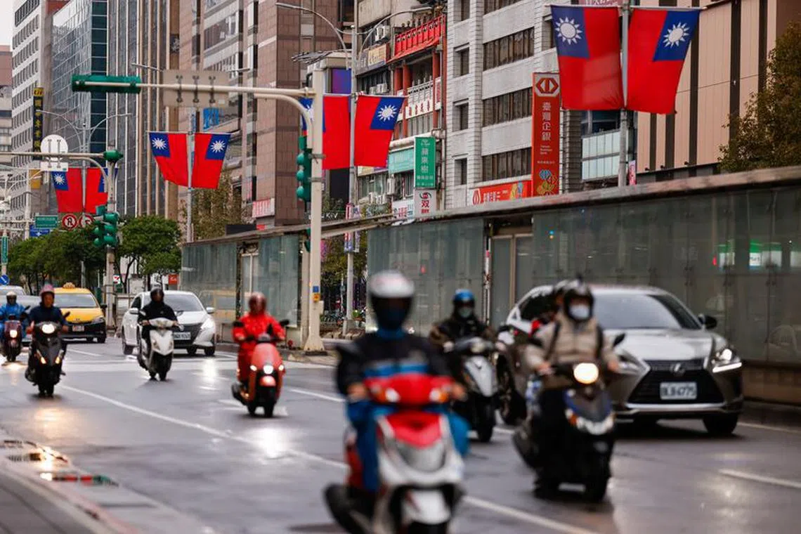 Taiwan flags can be seen in the streets in Taipei City, Taiwan  January 3, 2024. REUTERS/Ann Wang