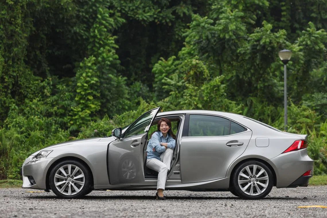 ST20240827_202424900534: Gin Tay/ctmycar11/ Chris Tan/
Profile of Author-educator Justina Tan and her Lexus, at Dempsey on Aug 27, 2024.