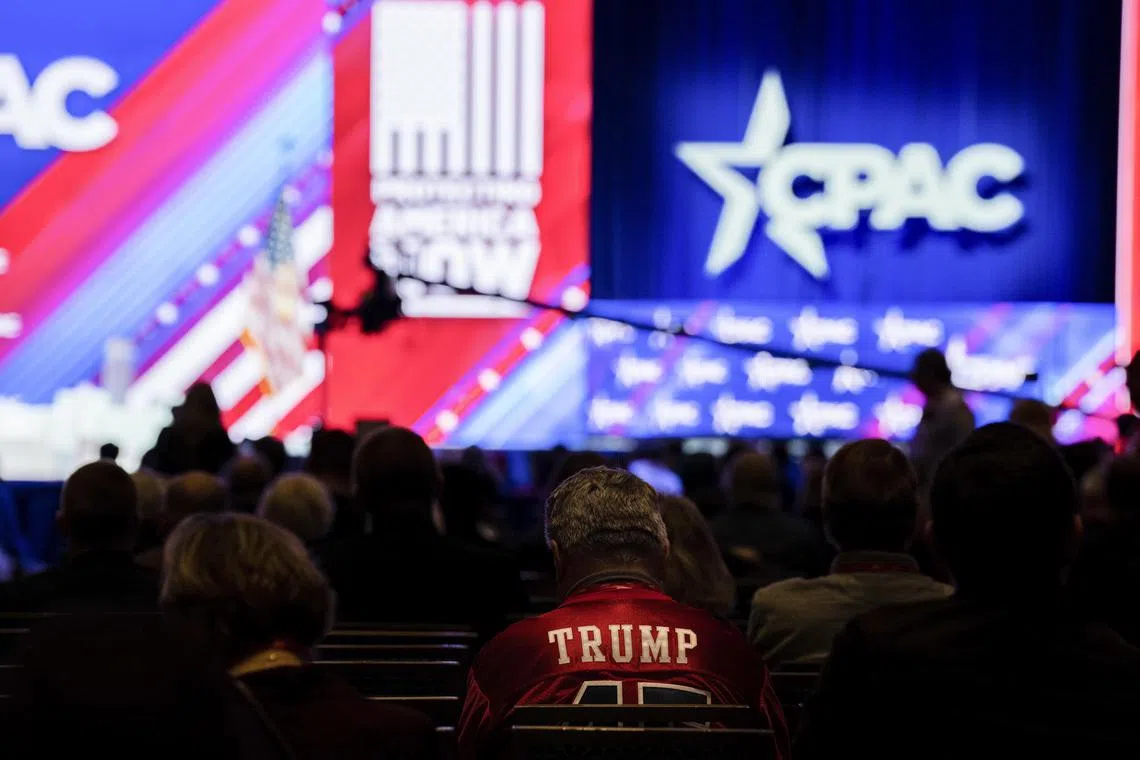 An attendee wears a jersey that shows his support for former President Donald Trump at the annual Conservative Political Action Conference in National Harbor on Thursday.