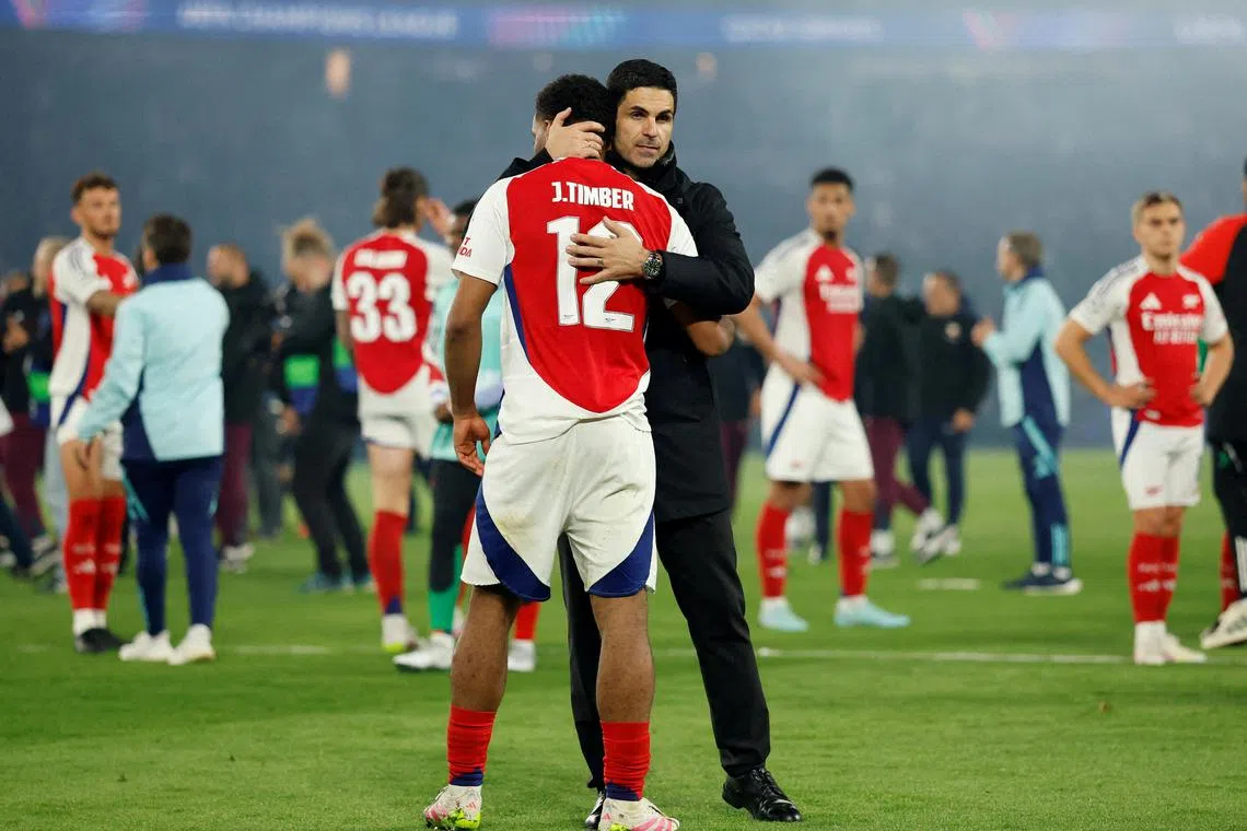 Arsenal defender Jurrien Timber and manager Mikel Arteta looking dejected after their 3-1 aggregate loss to Paris Saint-Germain in the Champions League semi-final, second leg on May 7. The Gunners lost 2-1 on the night at Parc des Princes.