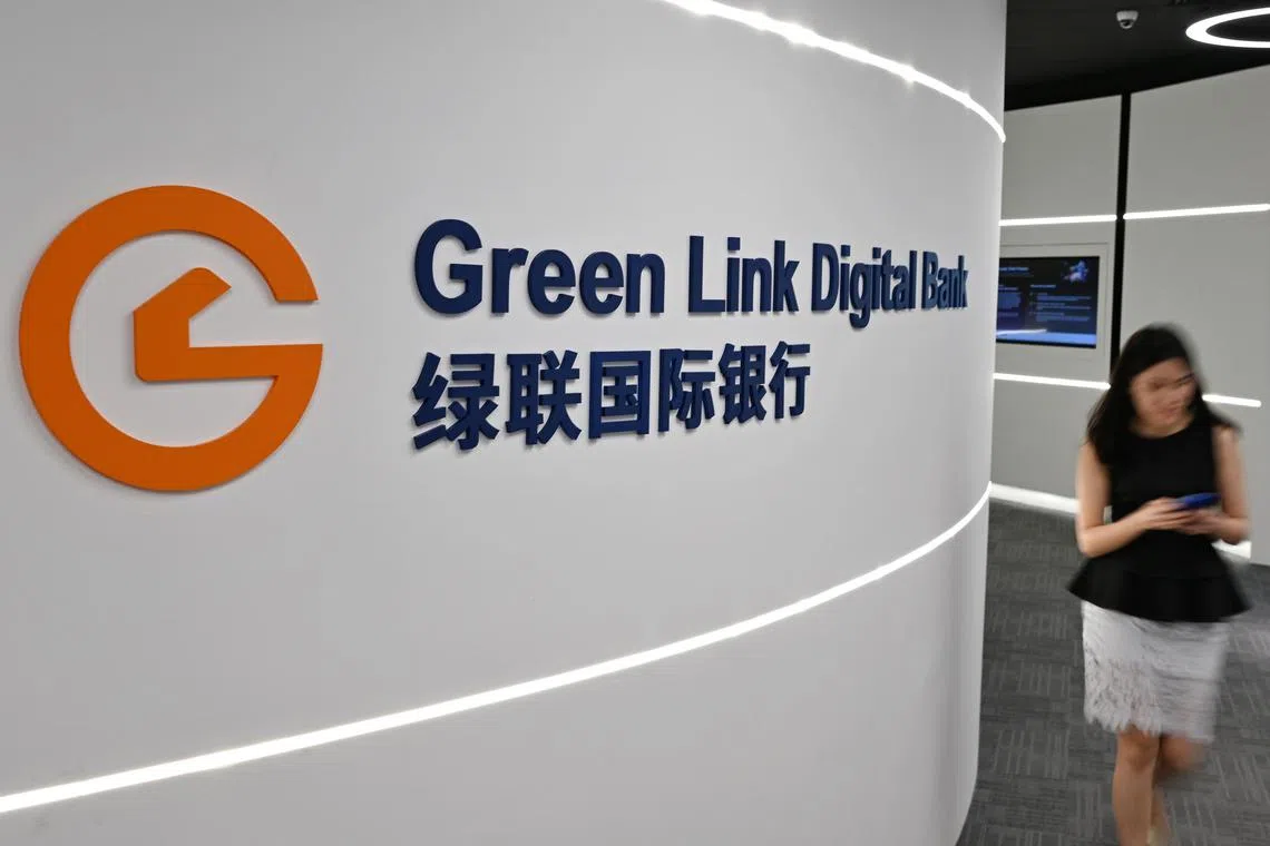 Generic photo of people walking past the Green Link Digital Bank logo taken on February 8, 2023

Interview with Dr Geng Jing, chairman of Green Link Digital Bank, on the bank's growth plans and impact of digital banks in Singapore.