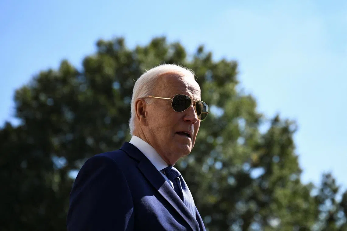 FILE PHOTO: U.S. President Joe Biden speaks to the press before departing for South Bend, Indiana, from the South Lawn of the White House in Washington, U.S., October 5, 2024. REUTERS/Annabelle Gordon/File Photo