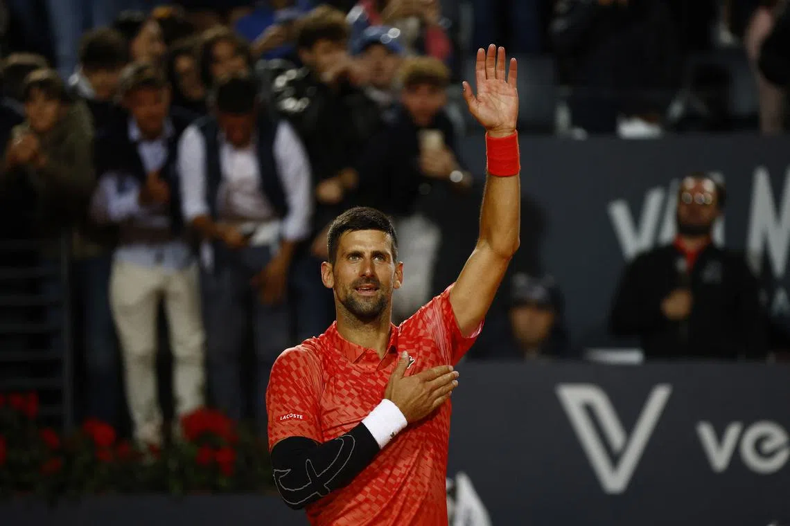 Serbia's Novak Djokovic celebrates after winning his round of 64 match/