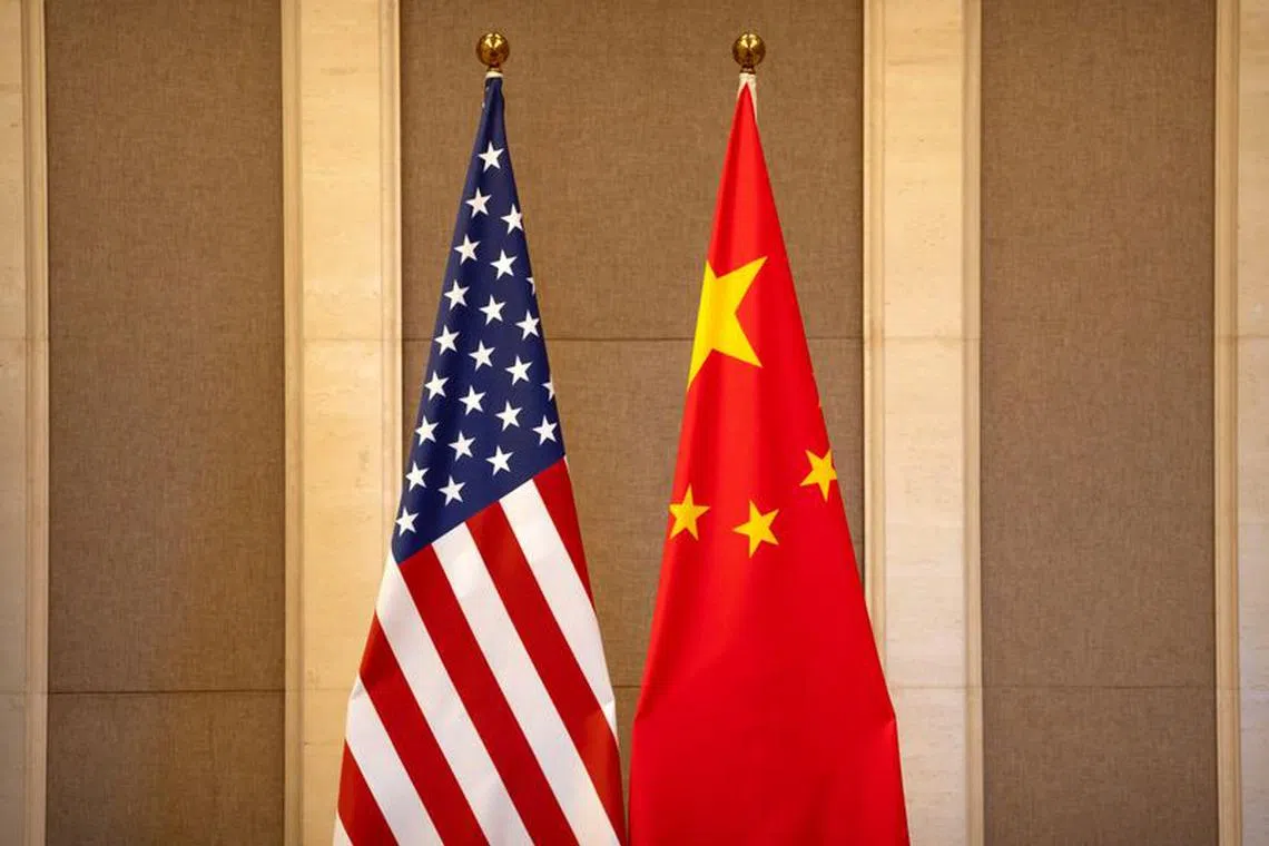 FILE PHOTO: United States and Chinese flags are set up before a meeting between U.S. Treasury Secretary Janet Yellen and Chinese Vice Premier He Lifeng at the Diaoyutai State Guesthouse in Beijing, China, Saturday, July 8, 2023.  Mark Schiefelbein/Pool via REUTERS/File Photo