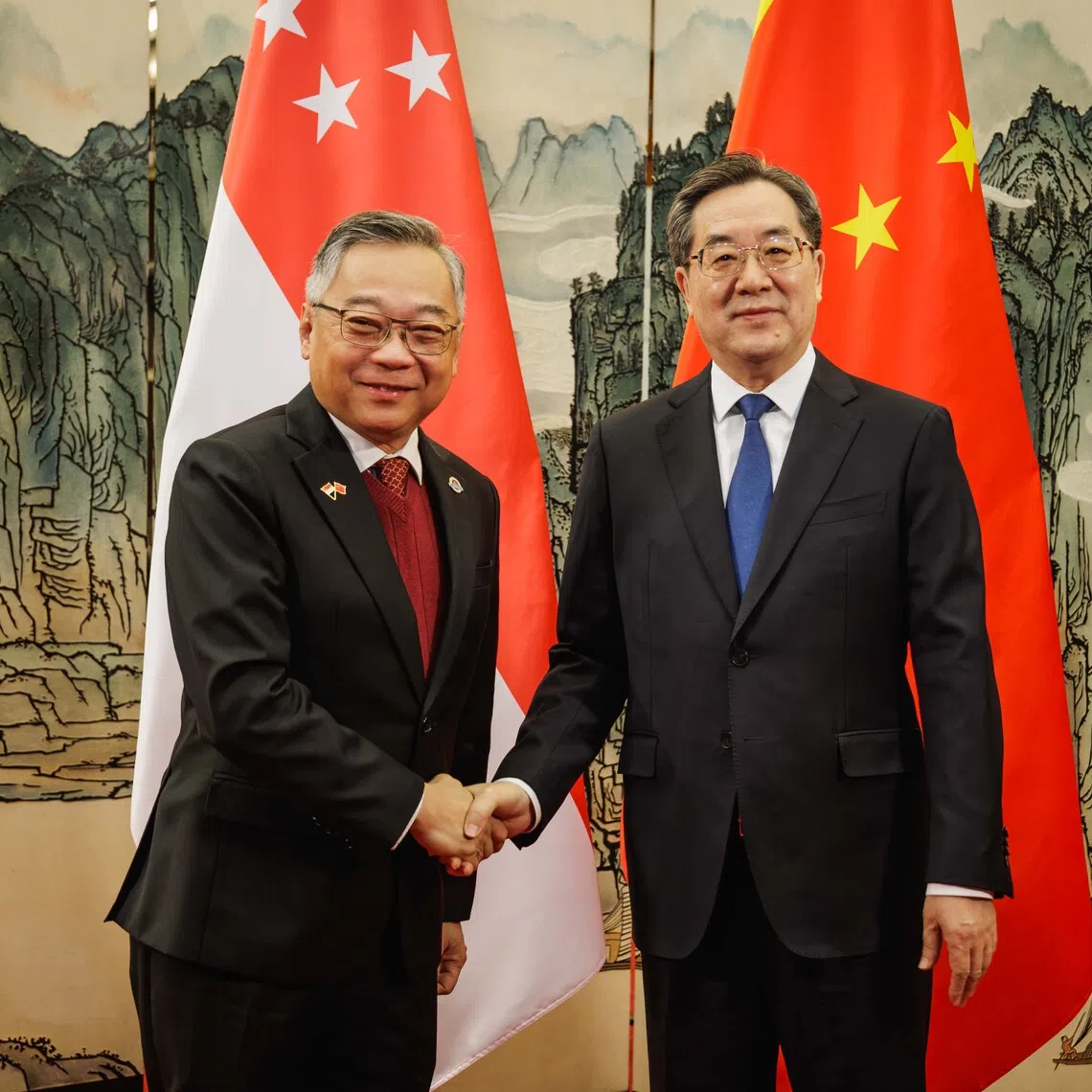 Deputy Prime Minister Gan Kim Yong (left) meeting Chinese Vice-Premier Ding Xuexiang in Chongqing, China, on Dec 15.
