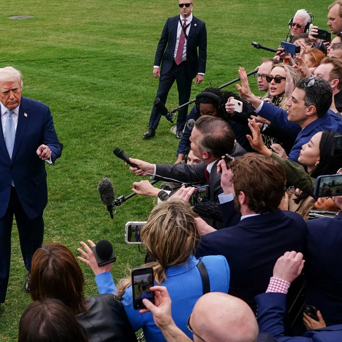 U.S. President Donald Trump speaks to the media as he departs the White House for Florida, in Washington, D.C., U.S., March 20, 2026. REUTERS/Nathan Howard