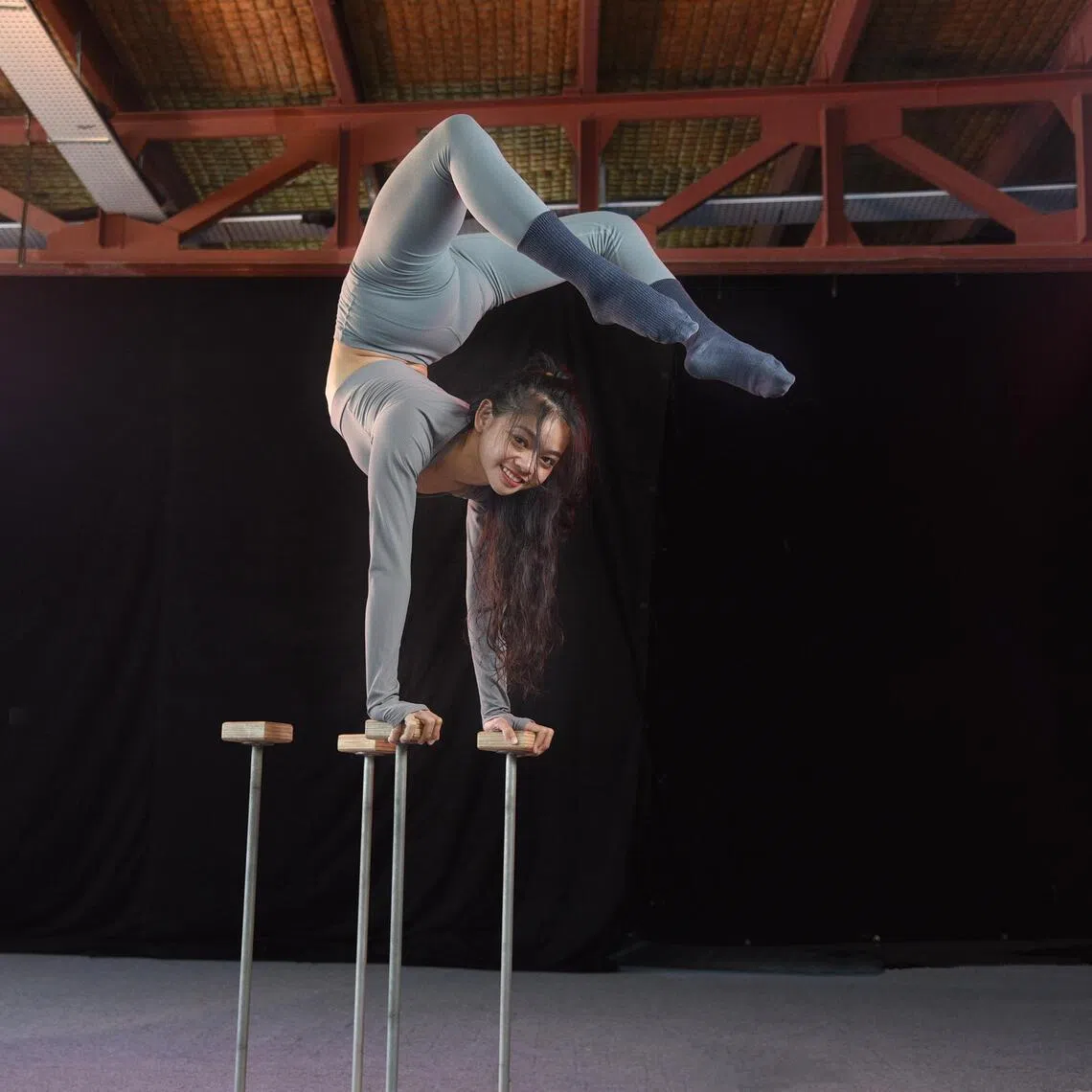 srbeverlywan - Beverly Wan performing a scorpion hand stand using the Handstand Canes. 

ST Photo: Desmond Wee

For ST Signature Series