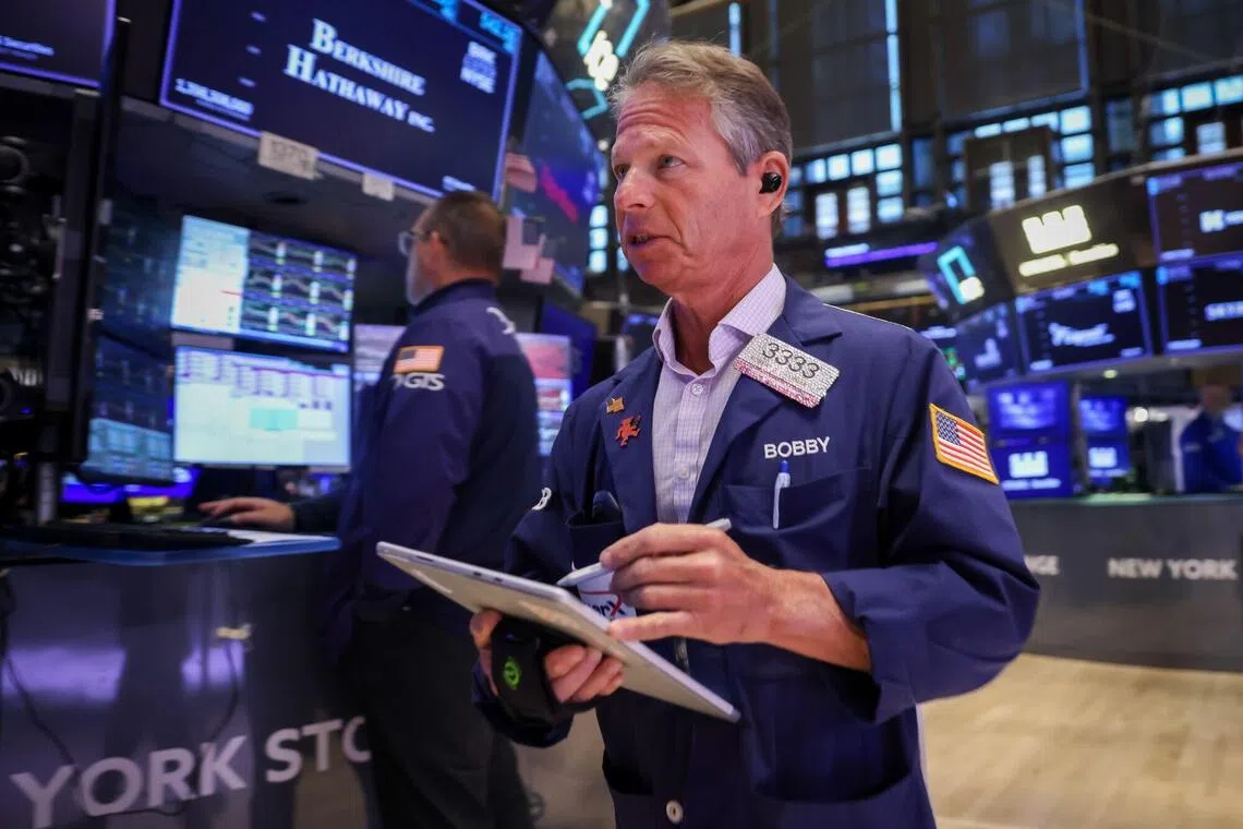 Traders working on the floor of the New York Stock Exchange in New York City on Oct 26.