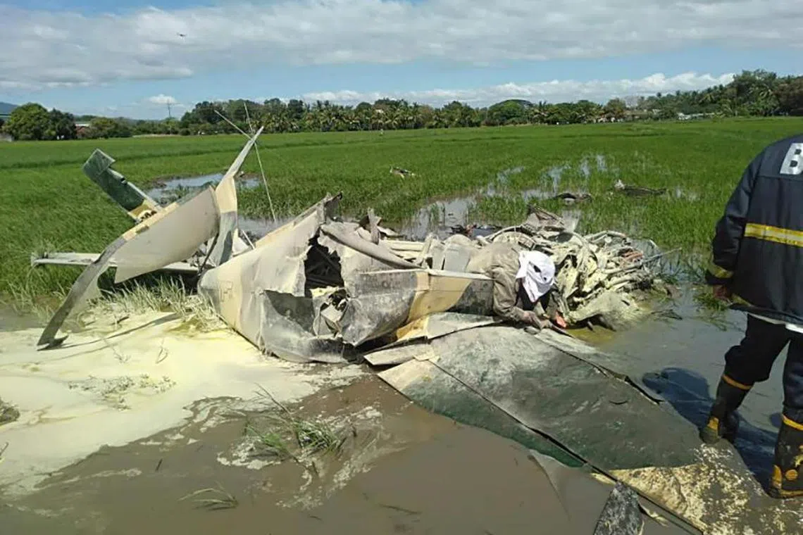 A Philippine Air Force training aircraft crashed on a farmland in Pilar town in Bataan province, Philippines, on January 25, 2023. 