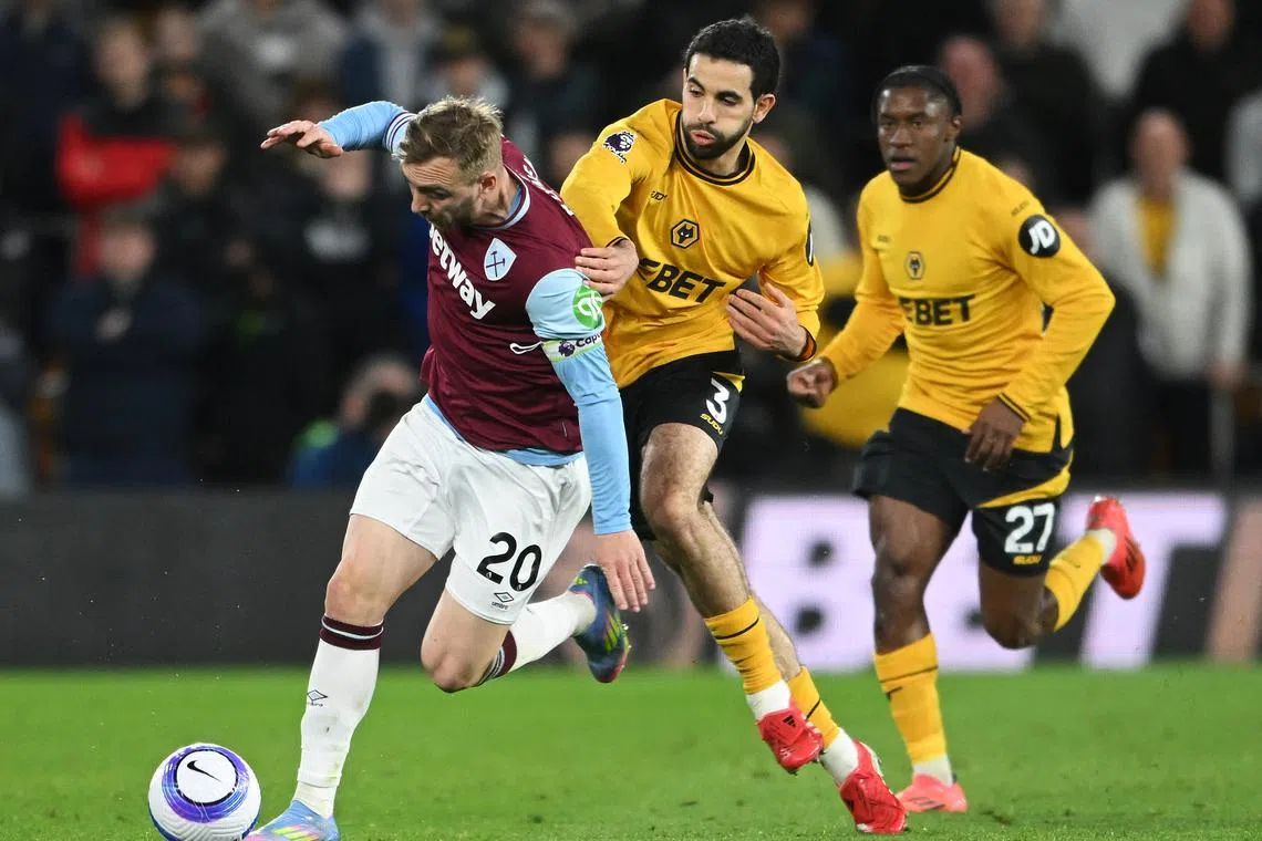 Wolves ease relegation worries with 1-0 win over West Ham | The Straits ...