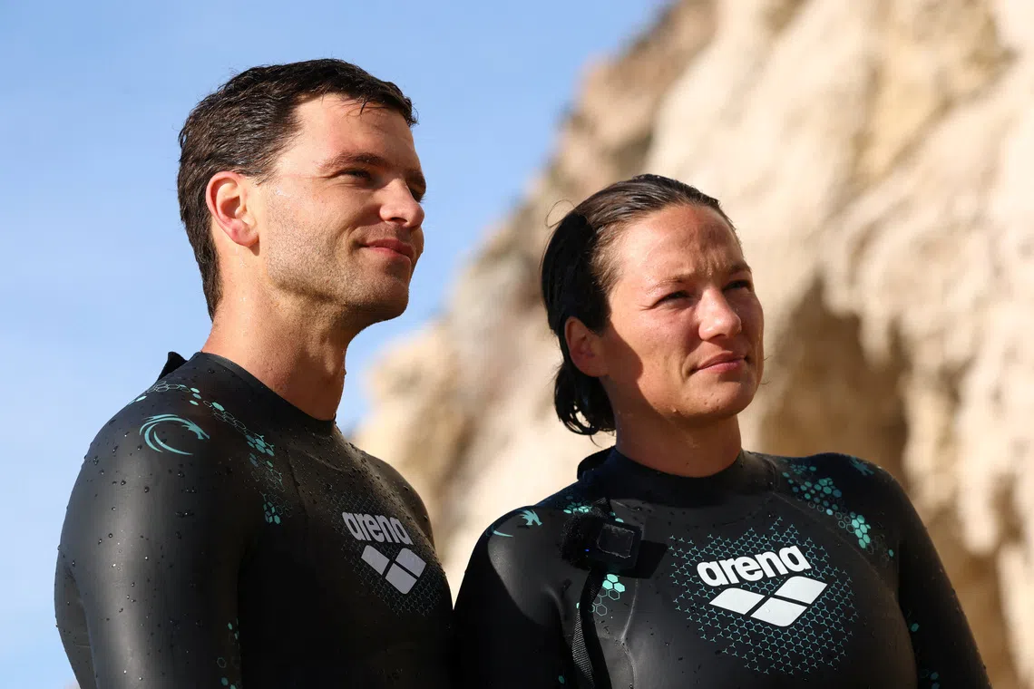French swimmers and 'eco-adventurers' Chloe Leger Witvoet and Matthieu Witvoet attend an interview after a training session, ahead of a cross-Atlantic swim scheduled to start in Cape Verde and to end in the French overseas department of Guadeloupe, in Marseille, France, September 17, 2025. REUTERS/Manon Cruz