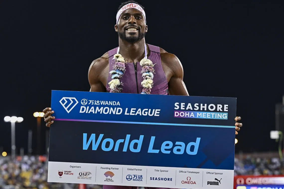 Kenneth Bednarek of United States celebrates after winning the men's 200m final at the Doha Diamond League.