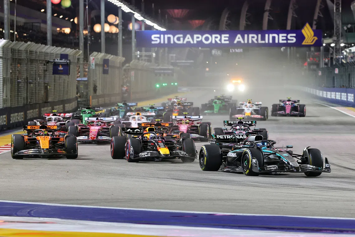 Mercedes' George Russell leading the pack during the 2025 Formula One Singapore Airlines Singapore Grand Prix at the Marina Bay Street Circuit on Oct 5, 2025. 