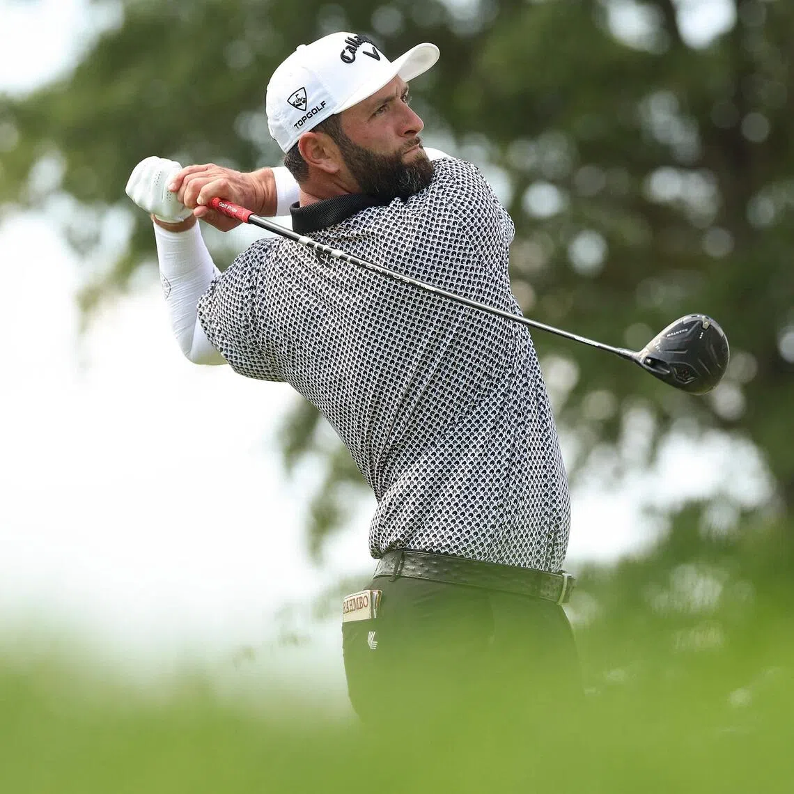 Jon Rahm of Spain playing his tee shot on the 12th hole during day two of LIV Golf New York on Aug 7.
