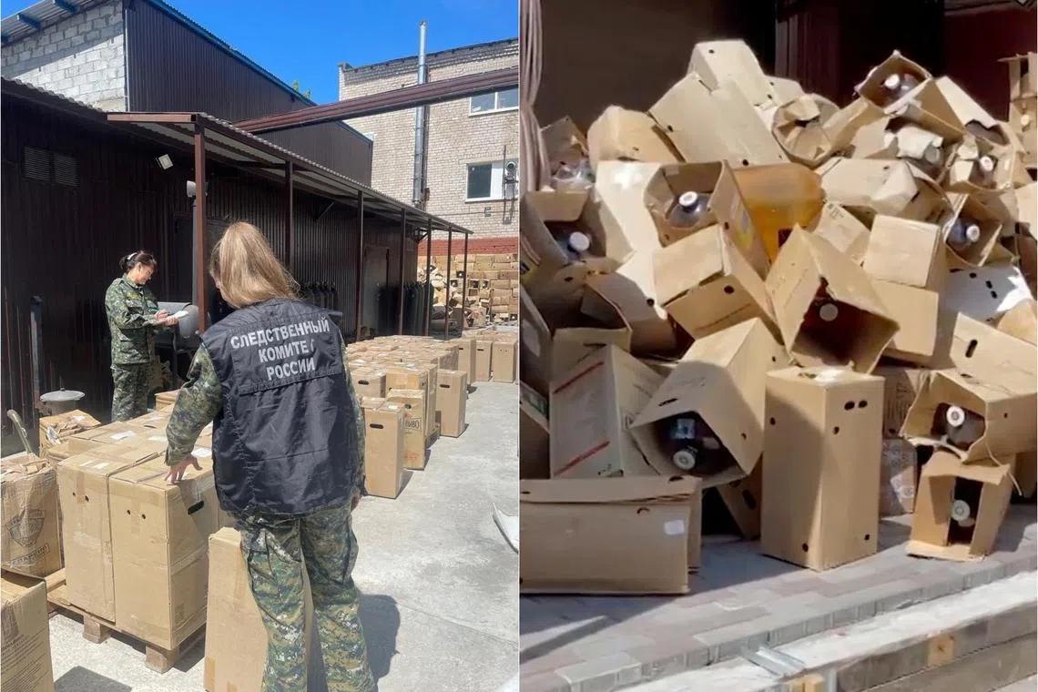 Russian investigators check the factory which produced the contaminated cider.