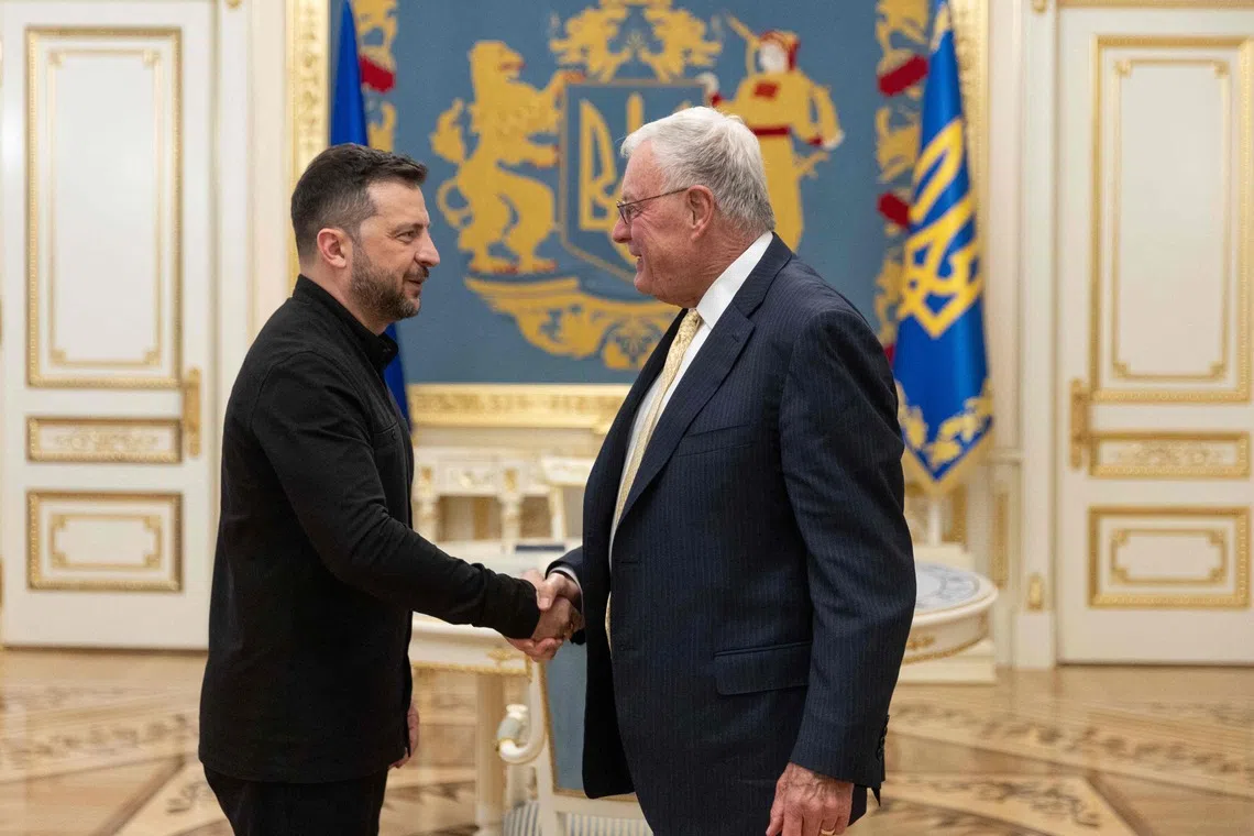 Ukraine's President Volodymyr Zelensky (left) greeting US special envoy for Ukraine Keith Kellogg during their meeting in Kyiv on Sept 11.
