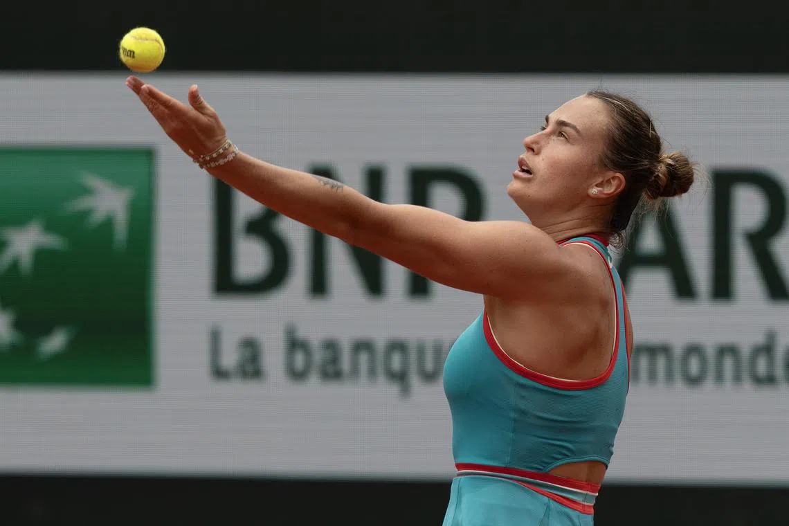 FILE PHOTO: Jun 1, 2025; Paris, FR; Aryna Sabalenka tosses the ball to serve during her match against Amanda Anisimova of the United States on day eight at Roland Garros Stadium. Mandatory Credit: Susan Mullane-Imagn Images/File Photo
