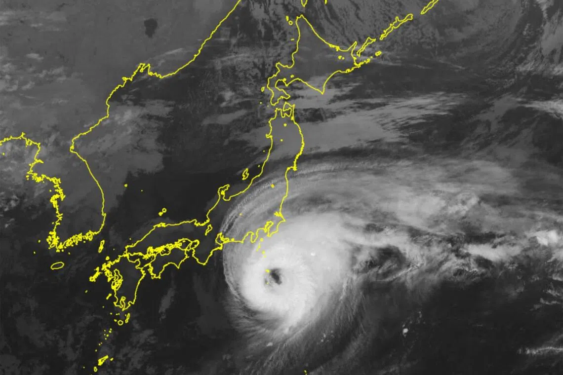 A handout from the Japan Meteorological Agency (JMA) released on Oct 9, 2025 shows a satellite image of Typhoon Halong moving closer to the Izu island chain.