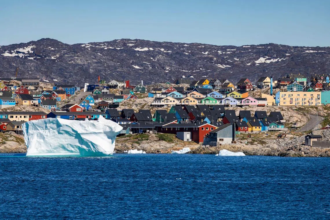 (FILES) Icebergs float in Disko Bay, Ilulissat, western Greenland, on June 29, 2022. A mile-thick (1.6-km) ice sheet in Greenland vanished around 416,000 years ago during a period of moderate natural warming, driving global sea rise to levels that would spell catastrophe for coastal regions today, a study said on July 20, 2023. The results overturn a long held view that the world's largest island was an impregnable fortress of ice over the past 2.5 million years, and instead show it will be far more vulnerable to human-caused climate change than previously thought. "If we want to understand the future, we need to understand the past," University of Vermont scientist Paul Bierman, who co-led the paper published in Science, told AFP. (Photo by Odd ANDERSEN / AFP)