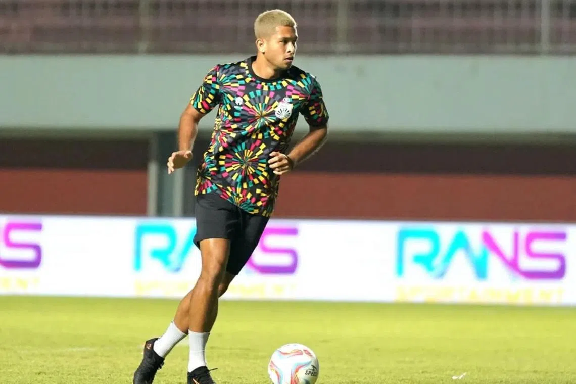Zulfahmi Arifin warming up before his debut for Indonesia Liga 1 club Bhayangkara FC on Nov 9.