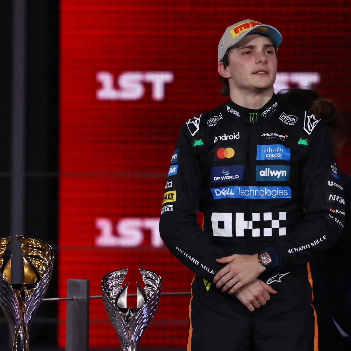 Formula One F1 - Abu Dhabi Grand Prix - Yas Marina Circuit, Abu Dhabi, United Arab Emirates - December 7, 2025 McLaren's Oscar Piastri stands on the podium after finishing second place in the Abu Dhabi Grand Prix REUTERS/Amr Alfiky