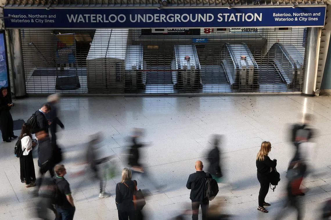 London commuters turn to bikes and boats as Tube strike enters second day