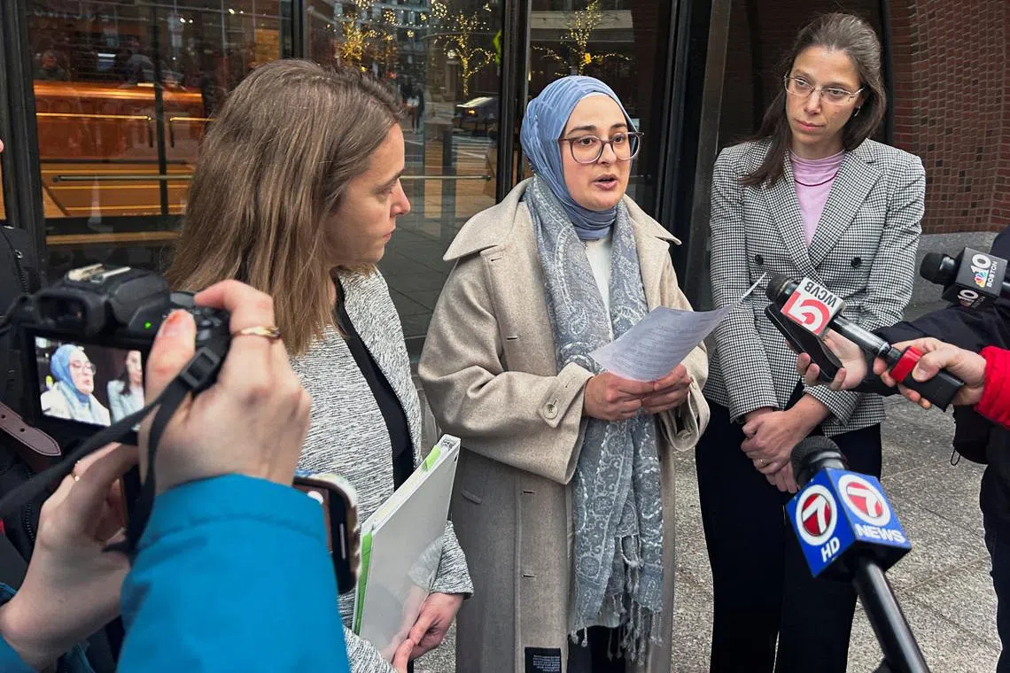 FILE PHOTO: Rumeysa Ozturk, a Tufts University student from Turkey, speaks to reporters after urging a federal judge to order the Trump administration to restore her student visa record, outside the federal court in Boston, Massachusetts, U.S., December 4, 2025. REUTERS/Nate Raymond/File Photo