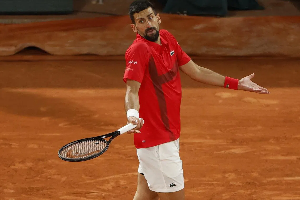 Tennis - French Open - Roland Garros, Paris, France - June 4, 2025 Serbia's Novak Djokovic reacts during his quarter final match against Germany's Alexander Zverev REUTERS/Stephanie Lecocq