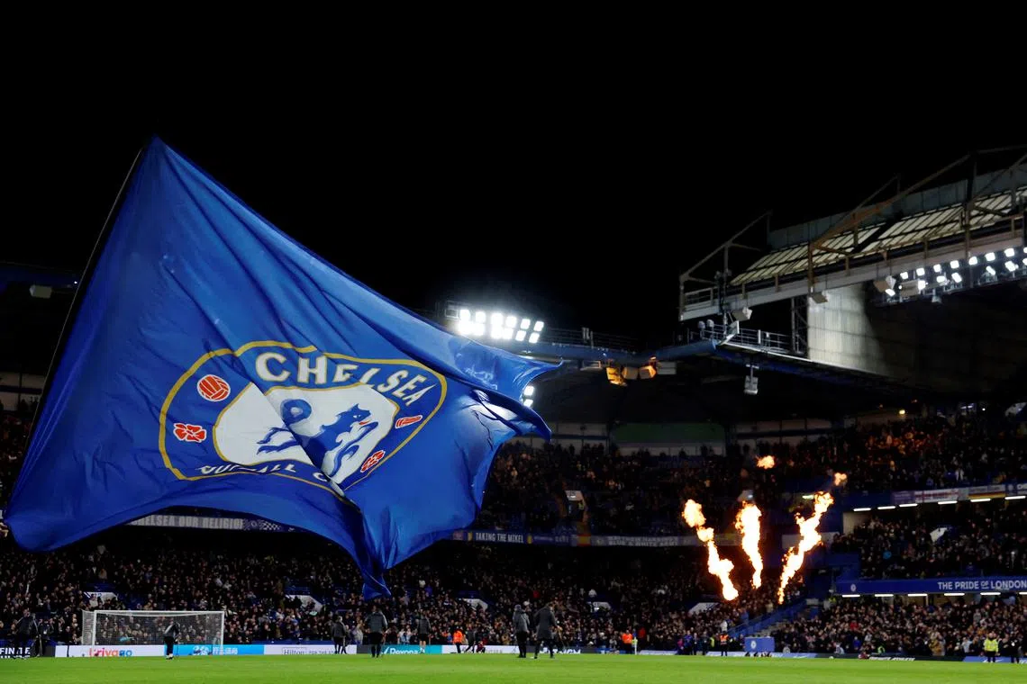 FILE PHOTO: Soccer Football -  FA Cup - Fourth Round - Chelsea v Aston Villa - Stamford Bridge, London, Britain - January 26, 2024 General view of a Chelsea flag beside the pitch before the match Action Images via Reuters/Andrew Couldridge/File Photo