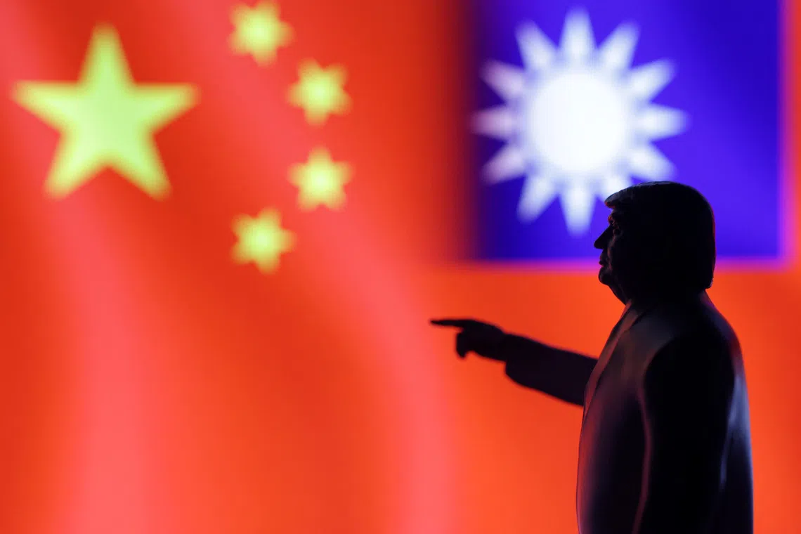 A 3D-printed miniature model depicting U.S. President Donald Trump, Chinese flag and fragment of Taiwanese flag in this illustration taken,  April 17, 2025. REUTERS/Dado Ruvic/Illustration