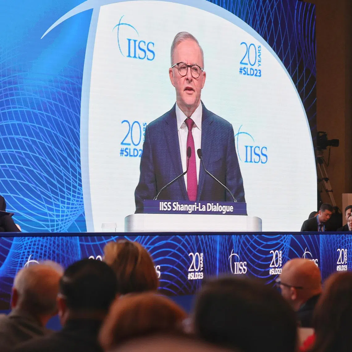 Australian PM Anthony Albanese seen on screen giving his speech at the opening of the Shangri-La Dialogue on June 2.