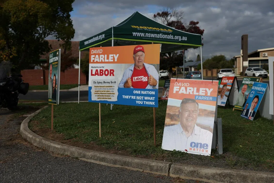 Campaign signs depicting One Nation candidate David Farley are displayed outside a pre-polling centre ahead of the Farrer by-election in Albury, Australia, May 6, 2026. REUTERS/Hollie Adams