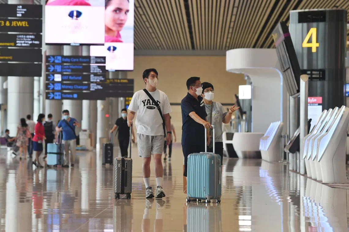 ST20220913_202231730290 hschangi13-ol/14 Chong Jun Liang Generic photo of passengers at the departure hall at Changi Airport Terminal 4 on September 13, 2022 Changi Airport will be welcoming the first flights to Terminal 4 when the terminal reopens on 13 September.