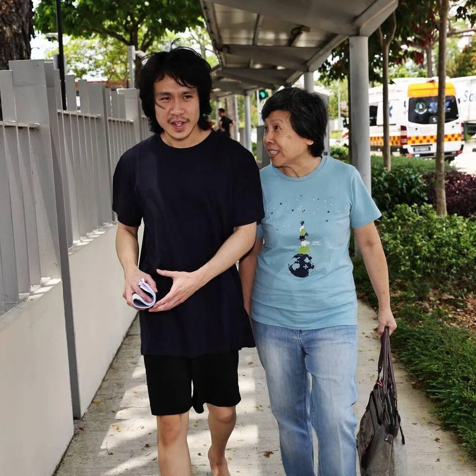 Amos Yee leaving Changi Prison with his mother on March 26. She had posted his $10,000 bail.